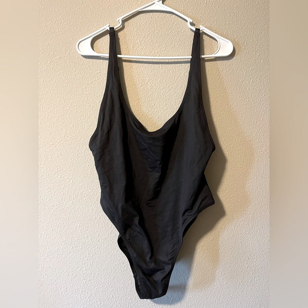NWT Skims signature scoop neck, one piece swimsuit. Color black